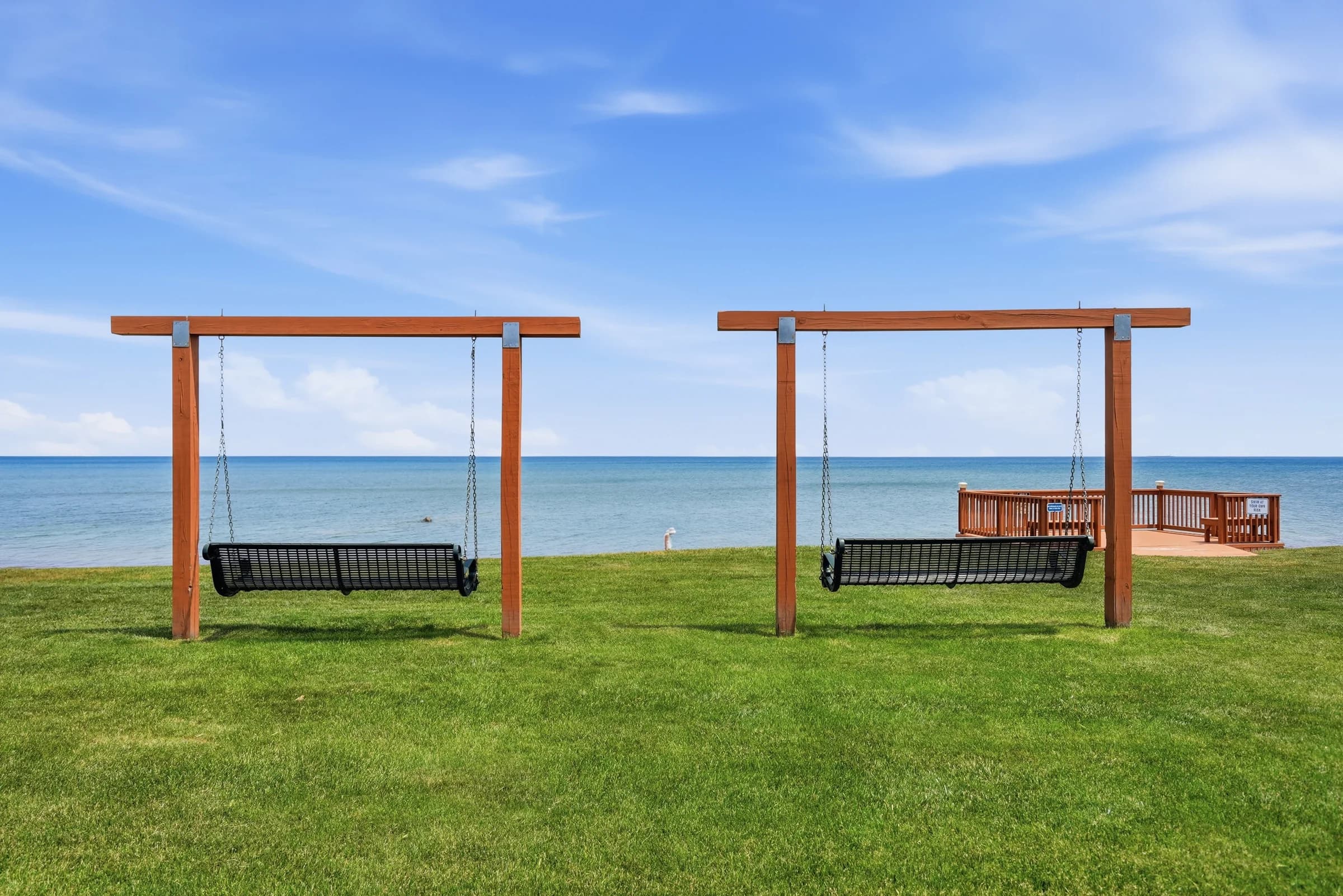 Lakefront swings overlooking Lake Huron at Huron Shores MHC